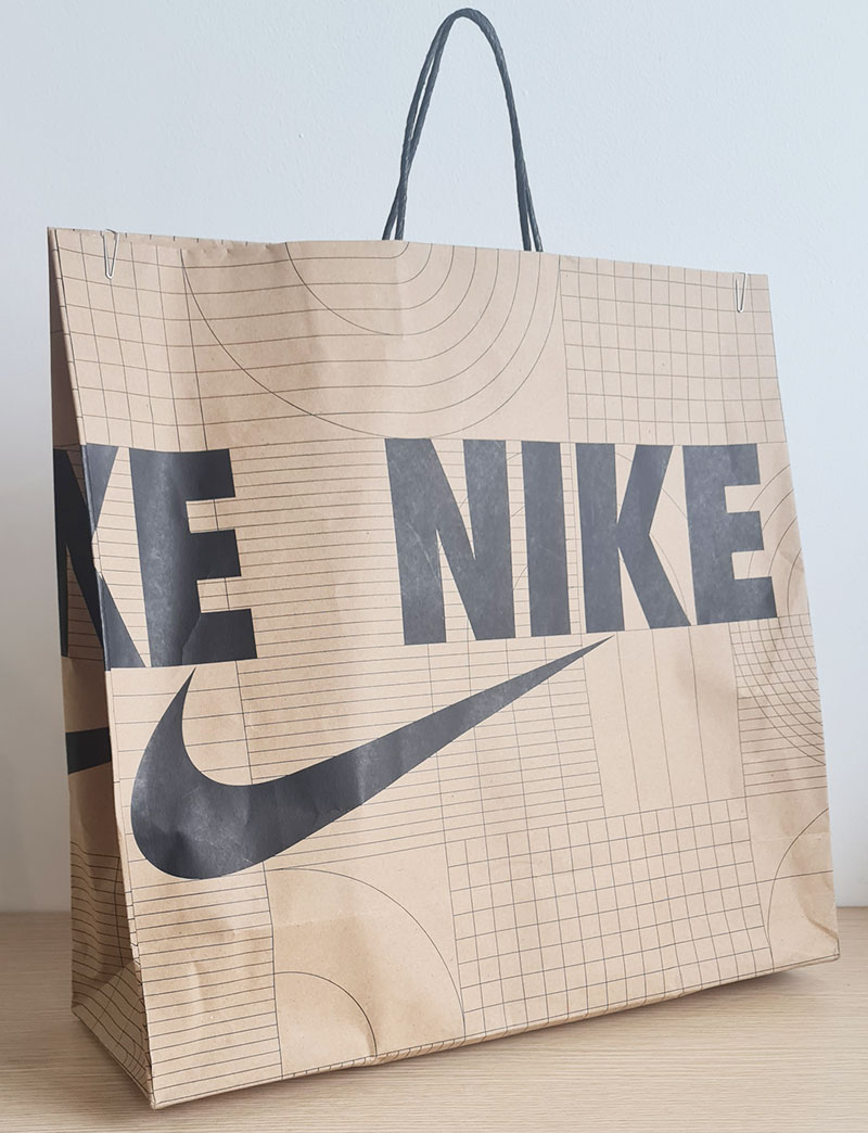 https://vnlbag.com/120gsm-Kraft-paper-bag-with-logo-printing,-twisted-handle-NIKE-1